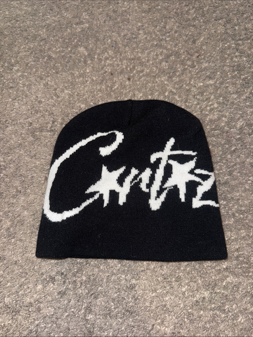 Black Beanie Hat with White Script Star Design